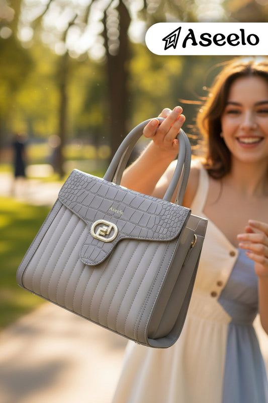 Maserati Handbag by Aseelo in gray