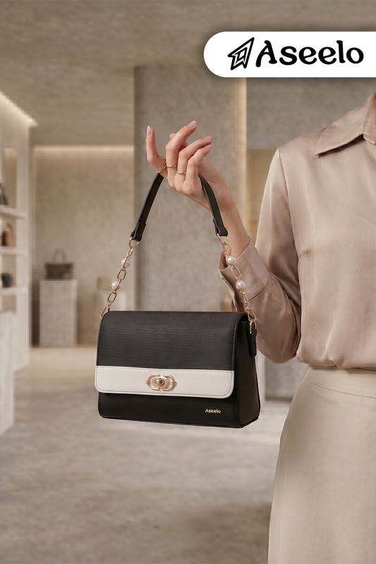 Phantom Handbag & Sling Bag by Aseelo in black