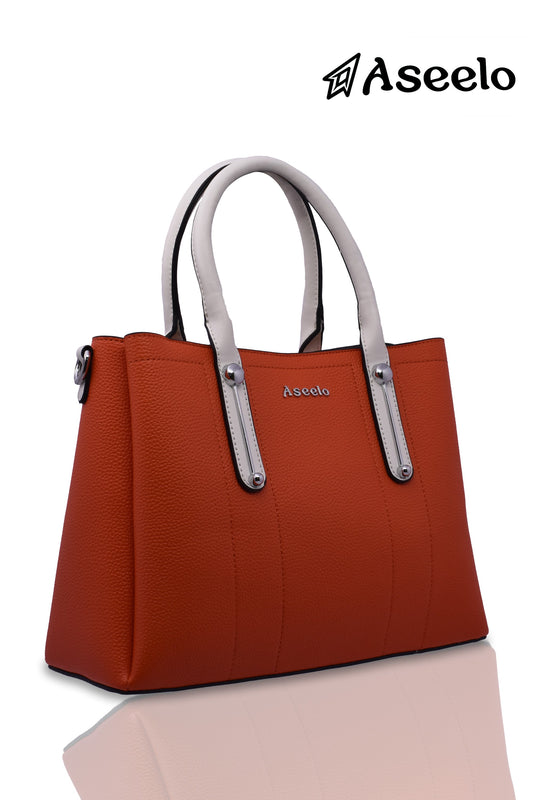 Jade Structured Handbag by Aseelo in orange