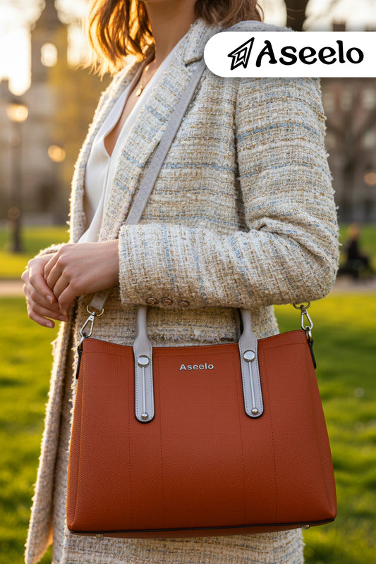 Jade Structured Handbag by Aseelo in orange